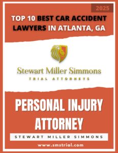 Stewart Miller Simmons Personal Injury Lawyers & Trial Attorneys | Atlanta, GA | Top 10 Best Car Accident Lawyers in Atlanta, GA | Image of a digitally created magazine cover that says: "Top 10 Best Car Accident Lawyers in Atlanta, GA" at the top. Stewart Miller Simmons Logo in the middle. "Personal Injury Attorney - Stewart Miller Simmons - www.smstrial.com" at the bottom - 2025
